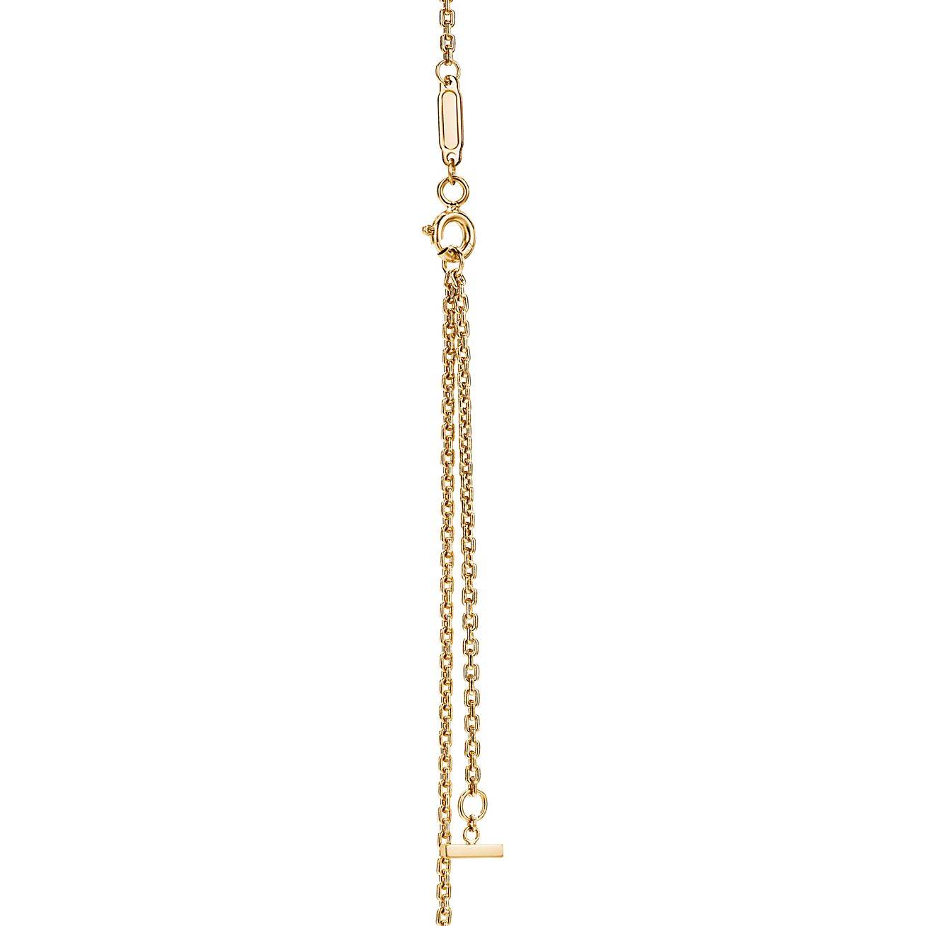 TIFFANY T SMILE PENDANT IN YELLOW GOLD, SMALL